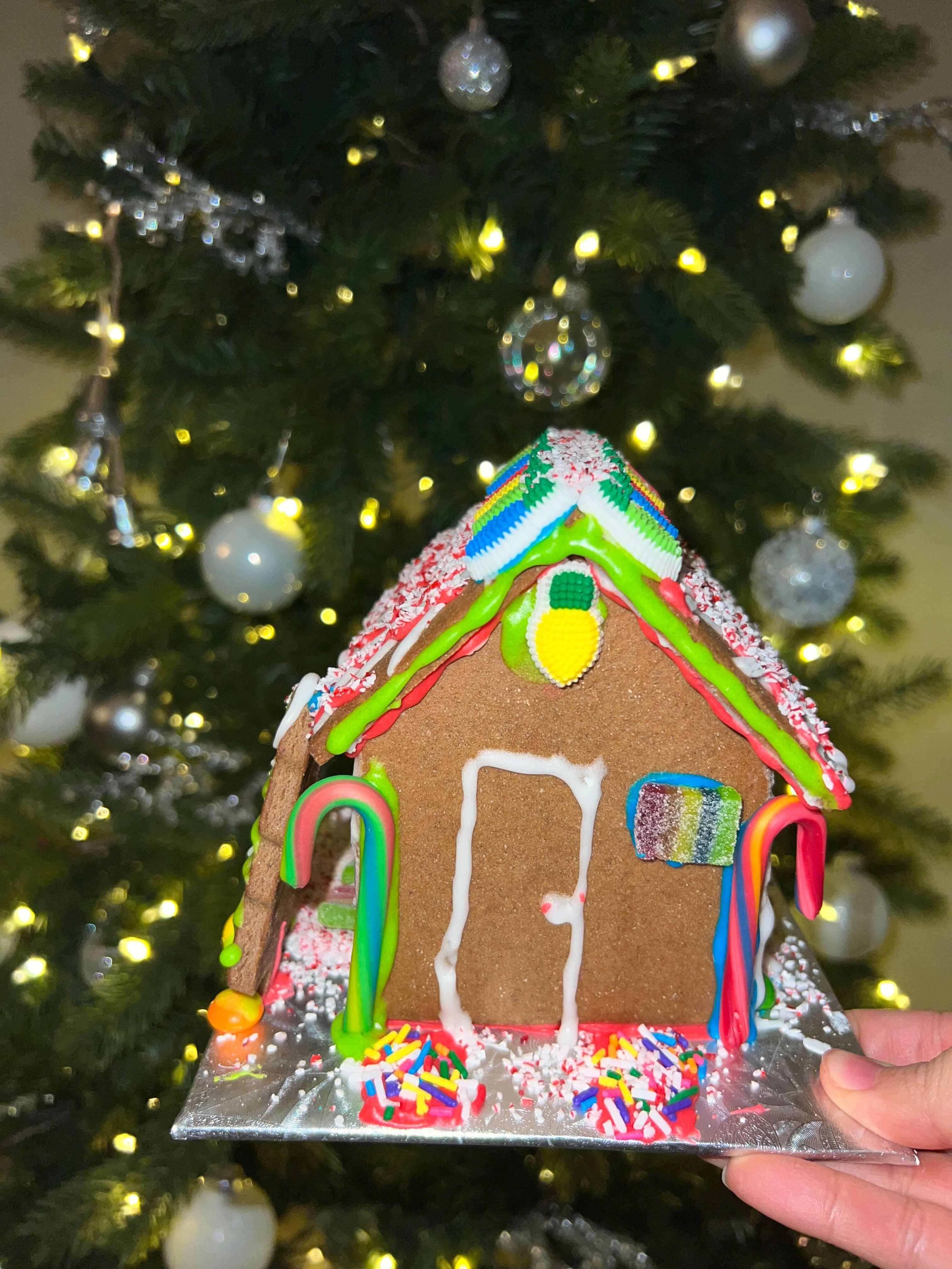 Unique gingerbread house decorated by foster youth